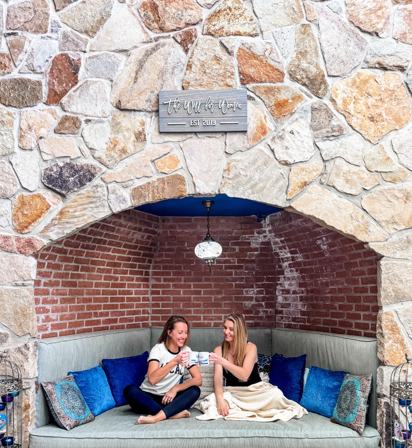 Women's Wellness Retreat in CT Women cozying up in Well for Women's New Haven massage spot